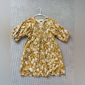 Peasant dress. Womens size Small. Mustard yellow with white floral. Knee length